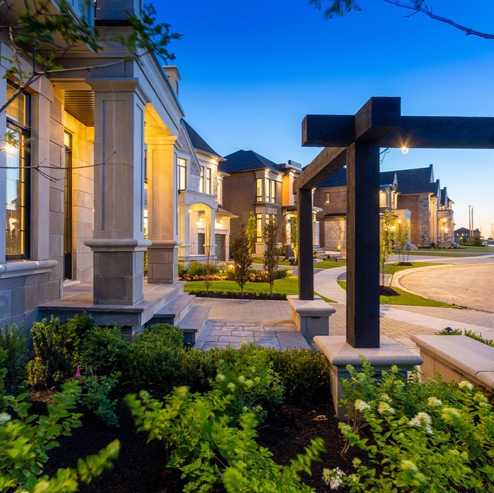 Front garden with timber feature and evening lighting