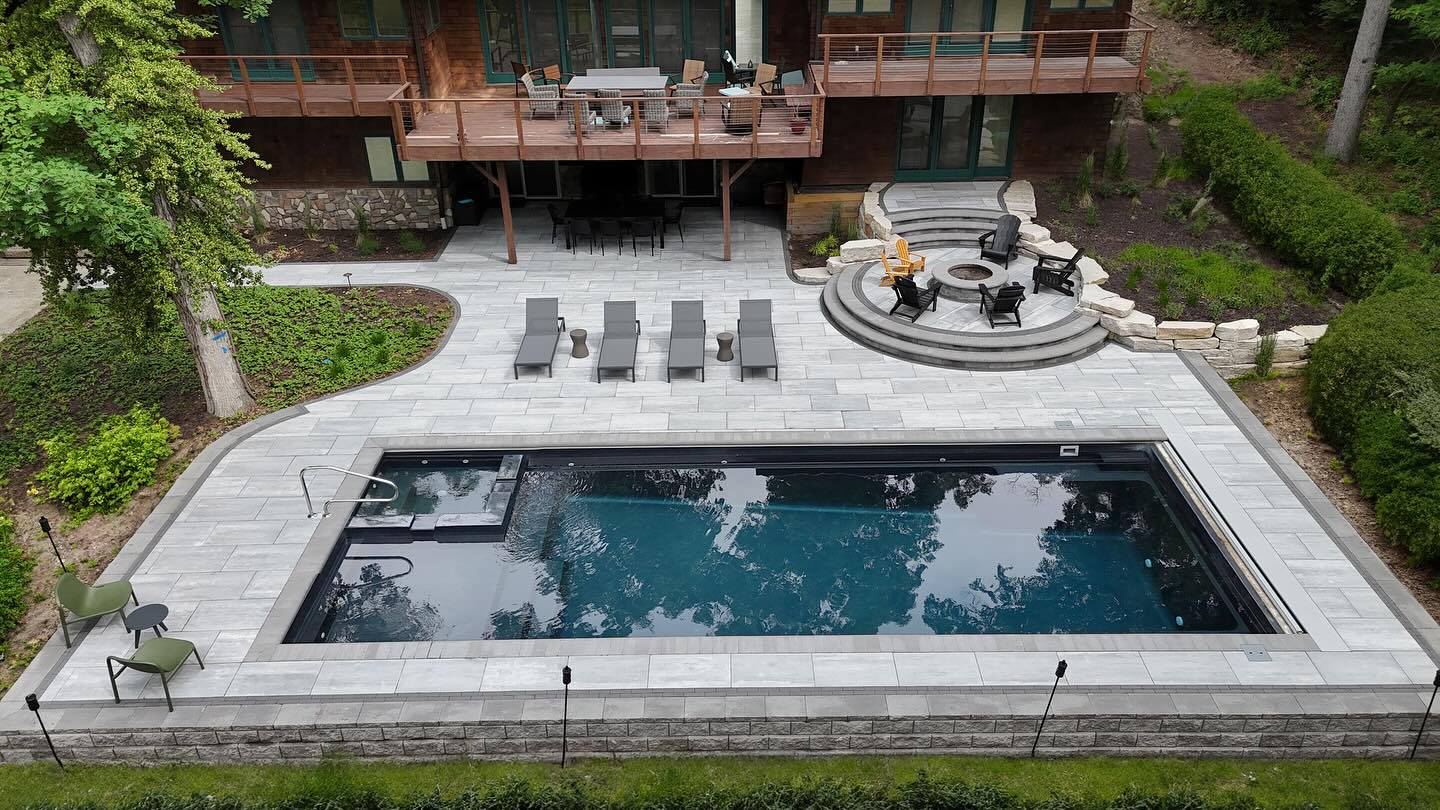 Pool terrace and tiered fire pit seating